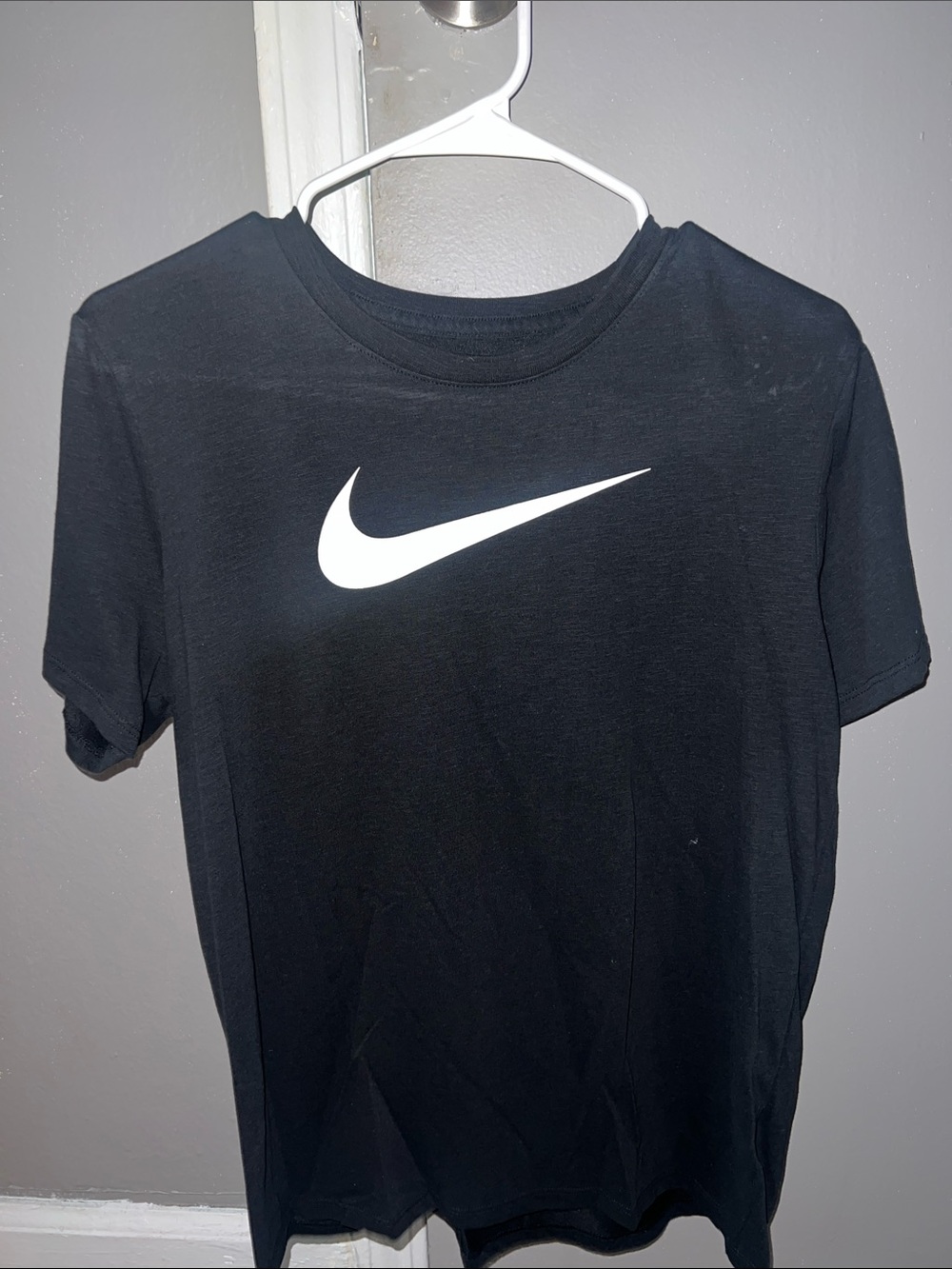 Nike Black Tee with White Swoosh Logo